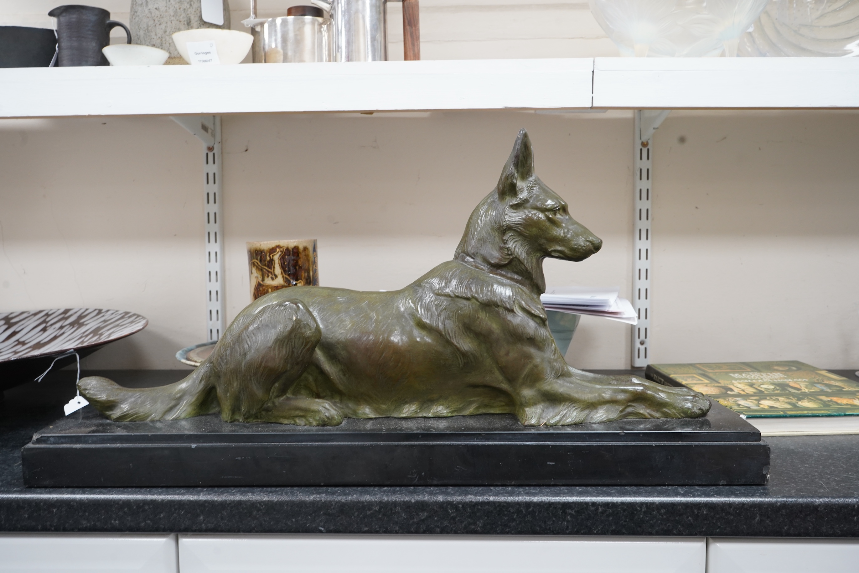 J.E. Masson - Bronze seated Alsatian dog on black marble stand, 70.5cm wide x 34.5cm high
